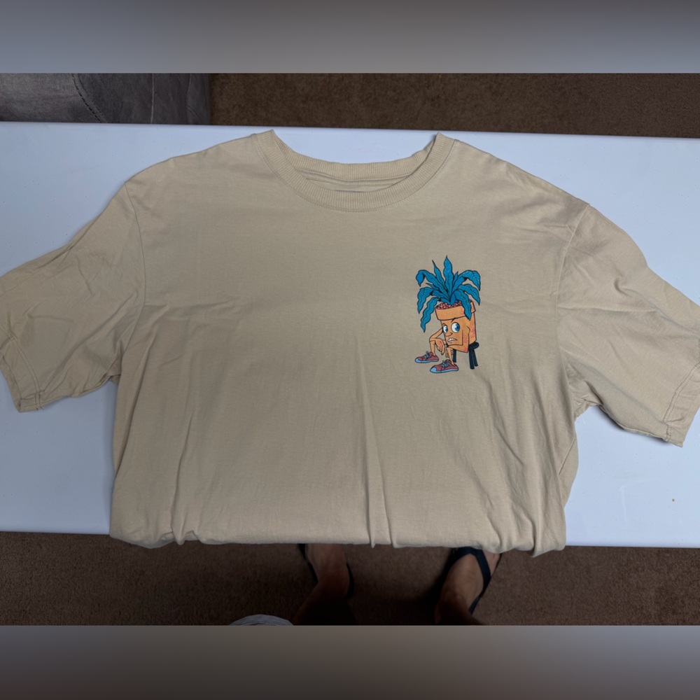 Beige T-Shirt with Blue Graphic